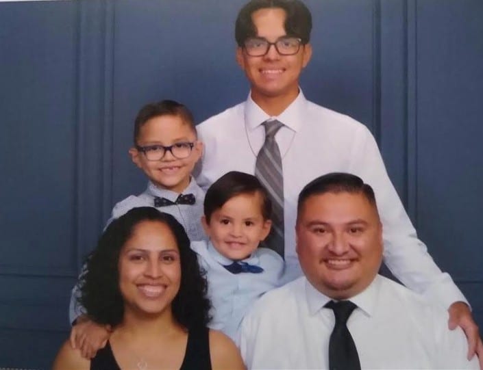 Carlos Reyes and his family